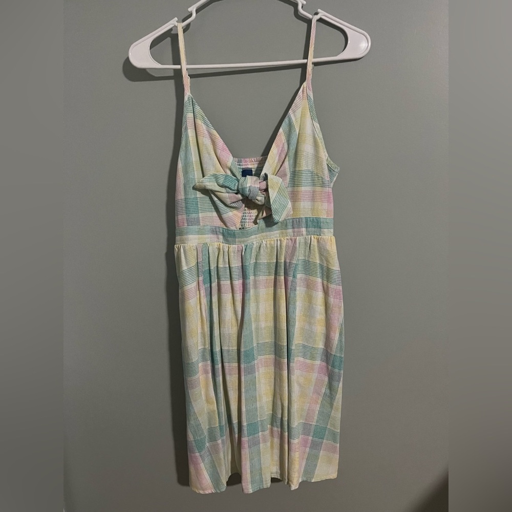Plaid pastel color dress. Adjustable straps, linen material and worn once.